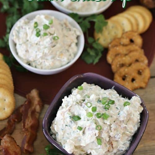 Three bowls of jalapeno cream cheese dip on a table.