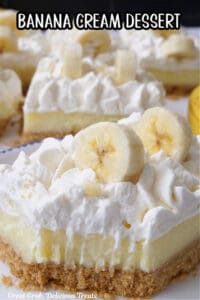 A close up of a banana bar with a bite taken out of it.