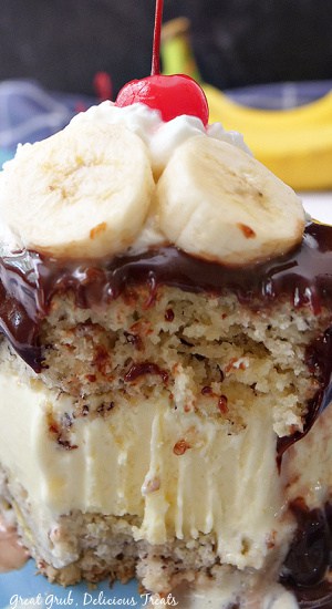 A close up picture of a slice of cake with a bite taken out of it.