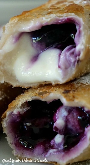 Blueberry Cream Cheese Egg Rolls are a delicious dessert recipe, made with fresh blueberries and a delicious cream cheese mixture. Two crispy egg rolls filled with cream cheese and blueberries.