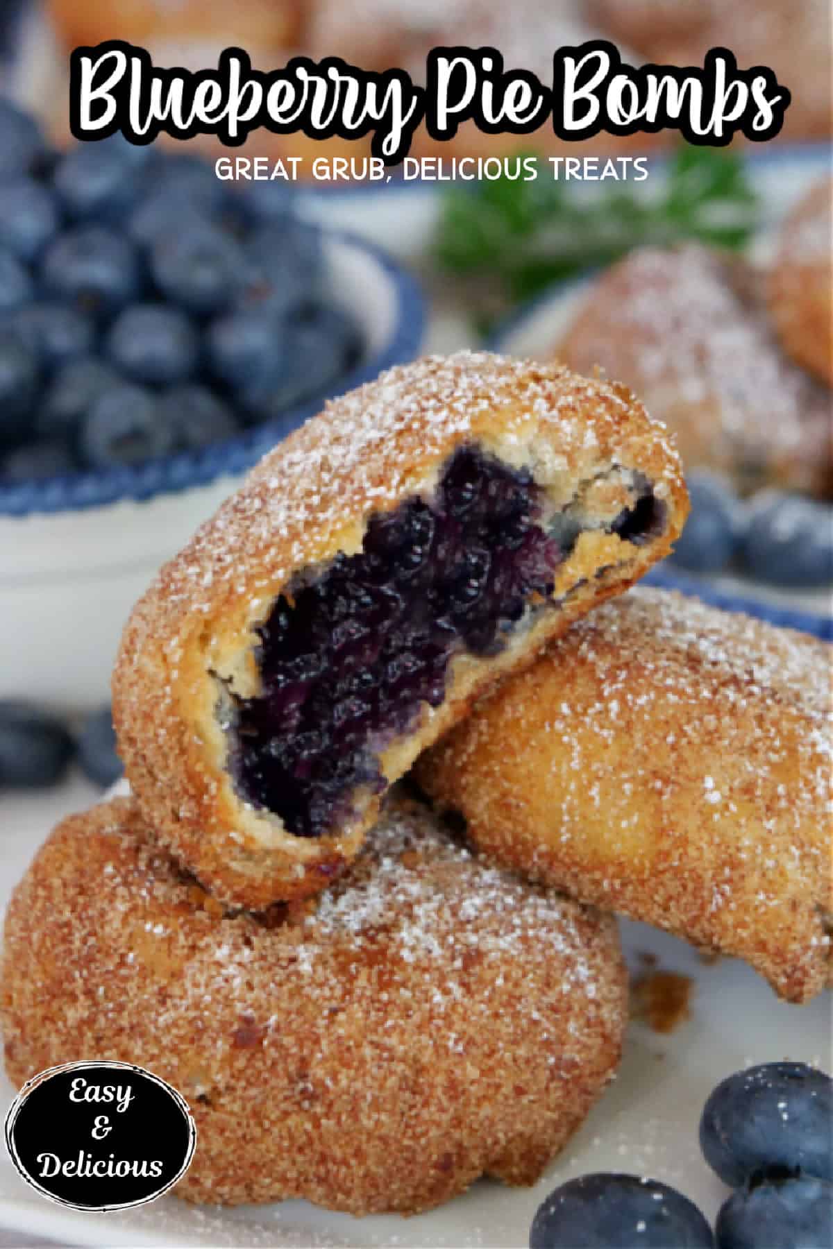 A white plate with three fried blueberry pie bombs with a bite taken out of the one on top, and the title of the recipe at the top.