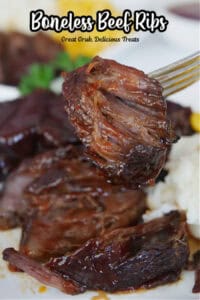 Beef ribs and a bite of the rib on a fork.