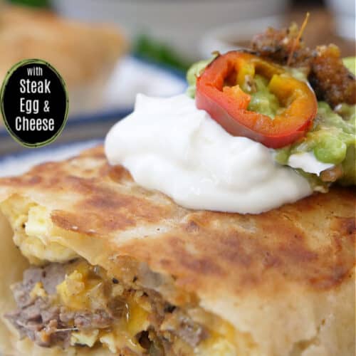 A white plate with a crispy fried breakfast burrito on it.