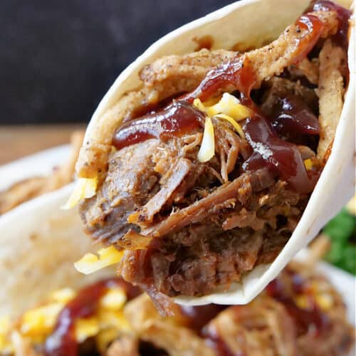 A close up of a brisket taco.