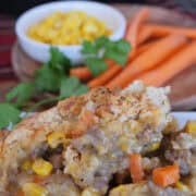 A white plate with cheddar bay cheesy beef pot pie on it.