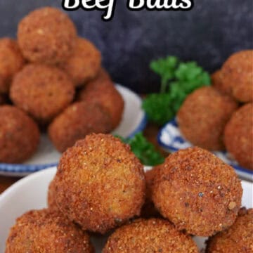 Three white plates with deep fried beef balls on it.
