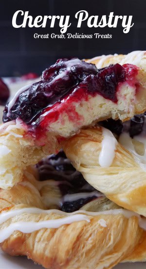 A close up of a few pastries stacked on top of each other with bites taken out of the top pastry.