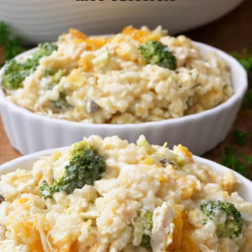 Two oval serving bowls filled with chicken broccoli rice casserole.