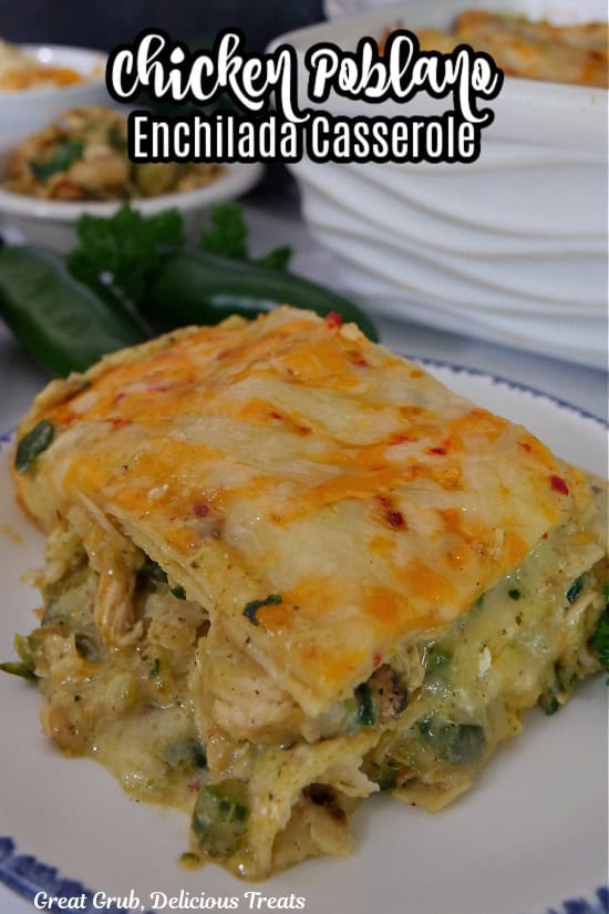A round white plate with blue trim with a slice of chicken poblano enchilada casserole on it and the title of the recipe at the top.