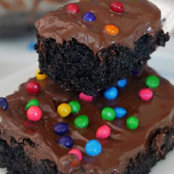 A cosmic brownie with a bite on a fork held above the brownie.