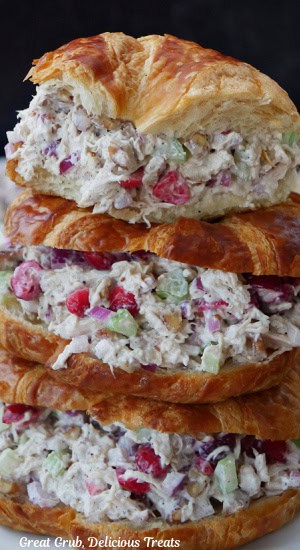 A stack of three crescent filled with homemade cranberry chicken salad.