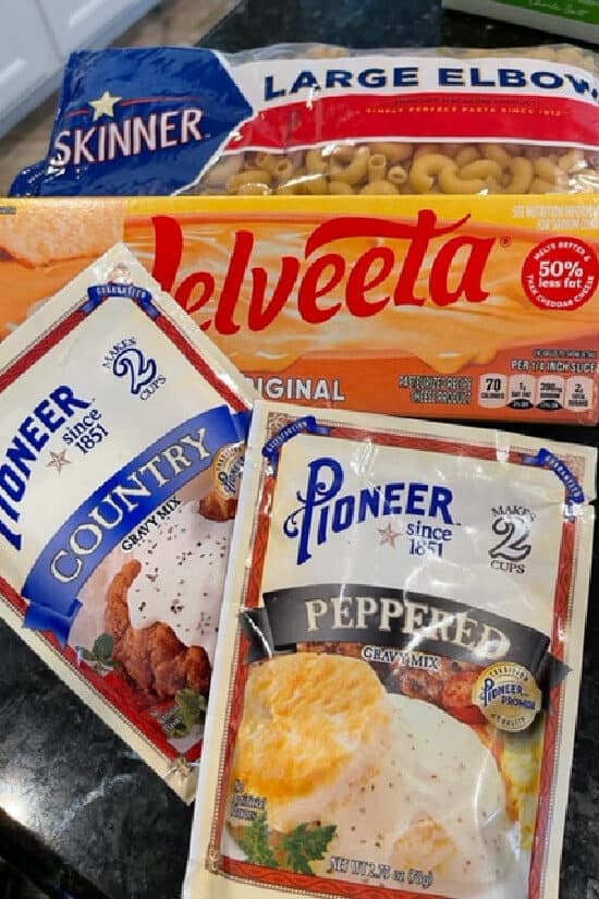 A photo of the 4 ingredients needed to make this creamy mac and cheese recipe.