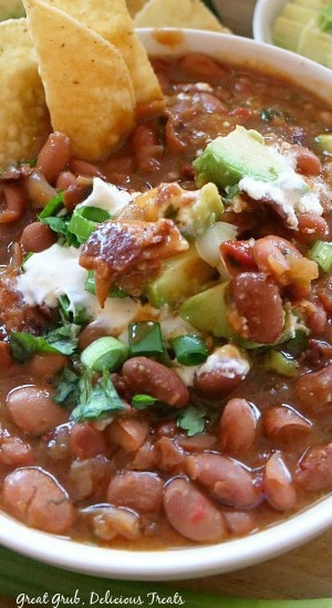 Crock Pot Spicy Charro Beans A close up photo of a white bowl with a serving of Crock Pot Spicy Charro Beans in it.