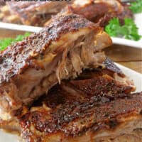 A plate full of pork ribs.