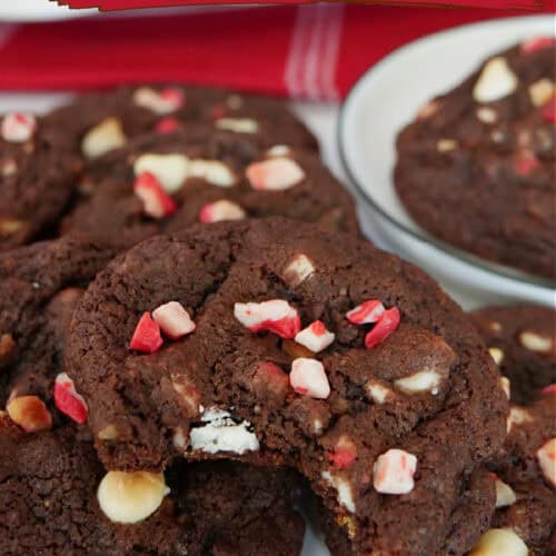 Dark chocolate peppermint cookies on a white surface with the title of the recipe, in text, at the top.