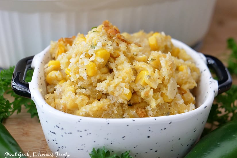 Corn casserole in a small baking dish.