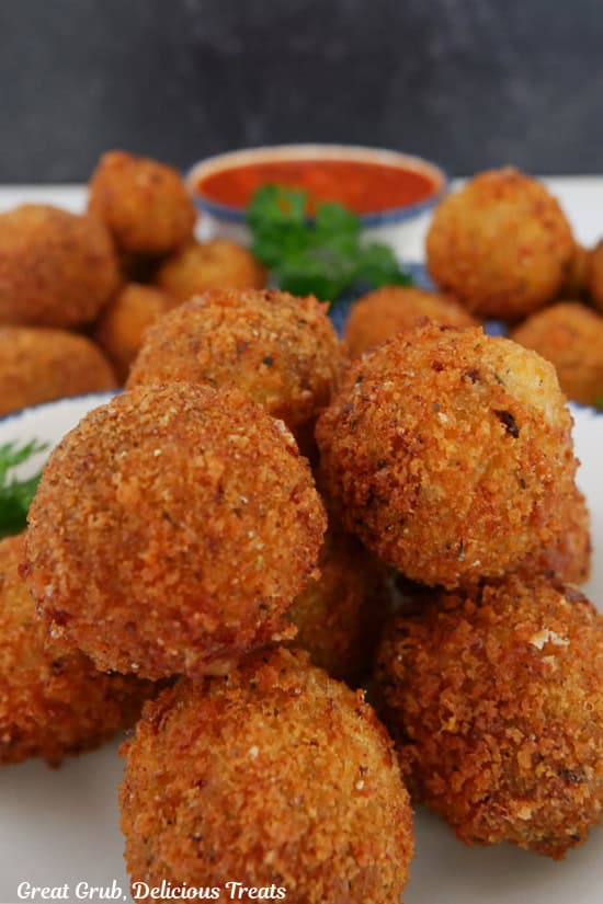 Crispy Italian sausage bites on a white plate