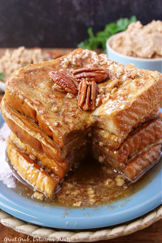 Maple Pecan French Toast is a delicious breakfast recipe to make for the family. A big stack of French toast covered in syrup and maple pecan butter.