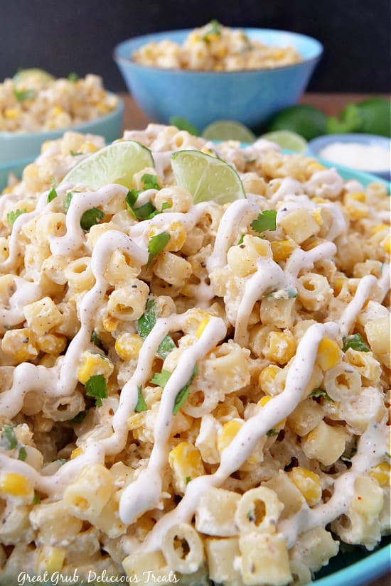 Mexican Street Corn Pasta Salad is a creamy and delicious pasta salad recipe that is made with fresh corn kernels, and a homemade street corn dressing. Mexican Street Corn Pasta Salad covered in a street corn dressing.