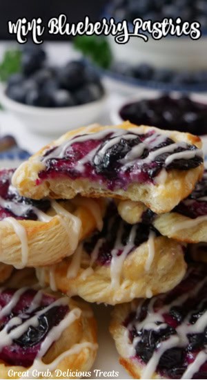 A small stack of bite-size pastries with a bite taken out of the top one.