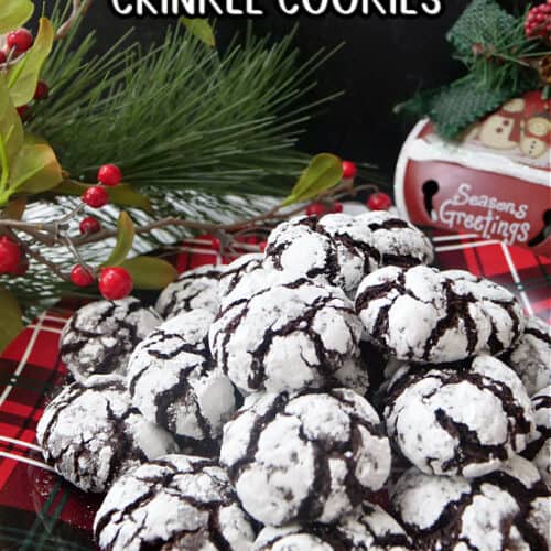 A red and black plaid plate with a plateful of mini chocolate crinkle cookies on it.