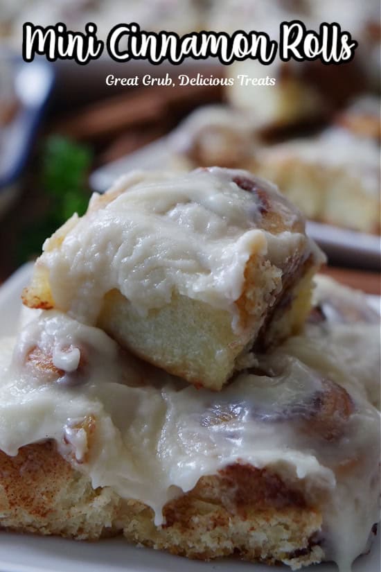 A white plate with a few mini cinnamon rolls on it.