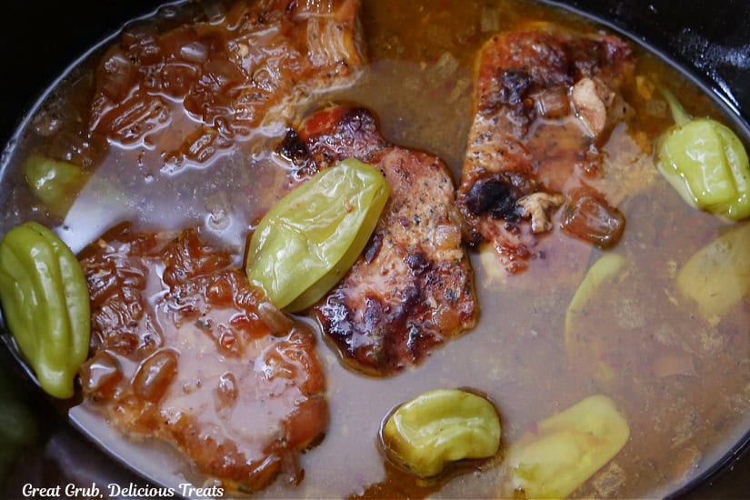 The slow cooked pork chops after they have cooked for 6+ hours.