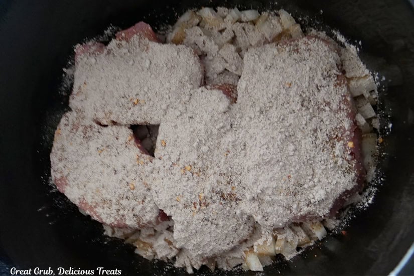 Au jus and ranch packets sprinkled over the pork chops.