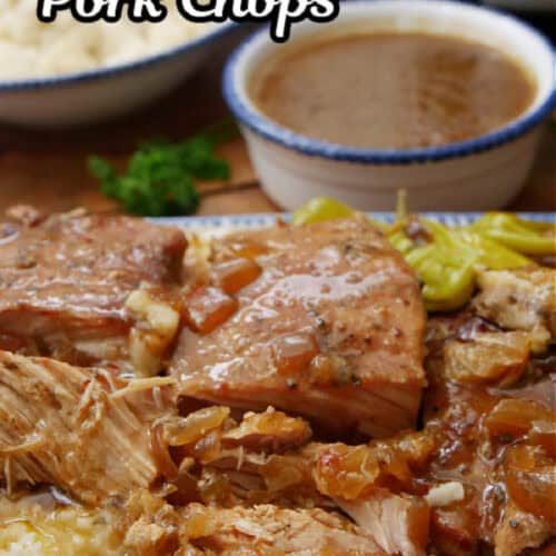 A white plate with blue trim with four boneless, slow cooked pork chops on it.