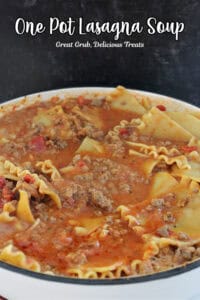 A white cast iron pot with homemade lasagna soup in it.