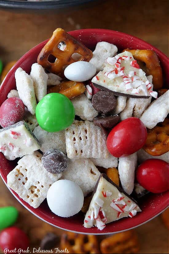A bowl filled with white chocolate puppy chow snack mix.