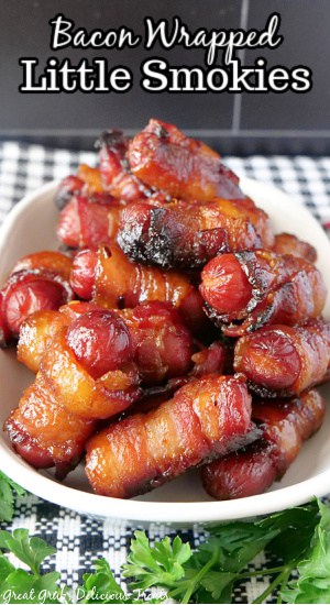 A white oval bowl filled with little smokies with the title of the recipe at the top of the photo.