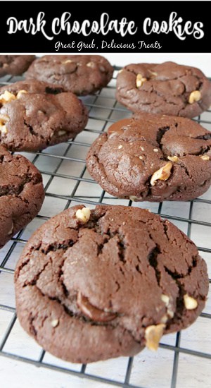 Dark chocolate cookies on a wire cooling rack with the title at the top.