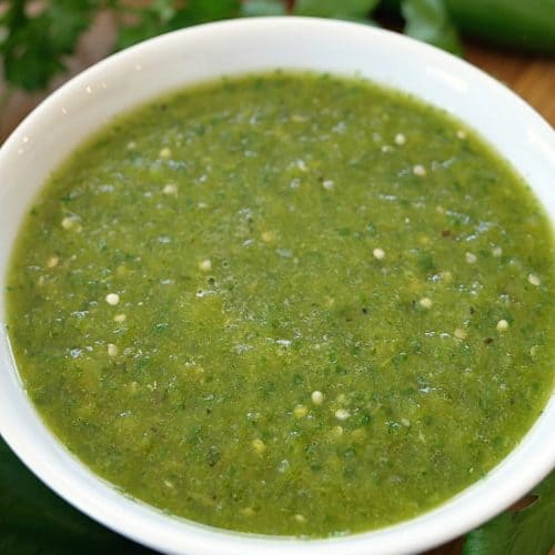 A white bowlful of salsa verde.