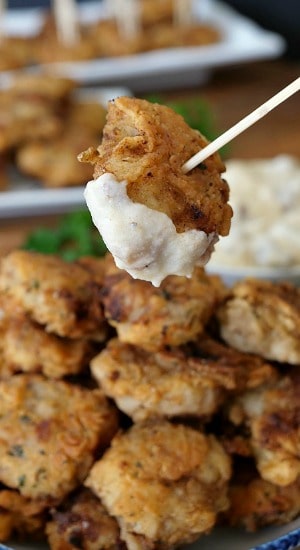 Chicken Fried Steak Bites smothered in country gravy make the most delicious appetizer recipe. Chicken Fried Steak Bites