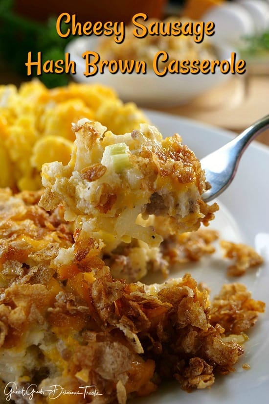 Cheesy Sausage Hash Brown Casserole is a delicious hash brown casserole recipe loaded with all sorts of yummy ingredients. Cheesy Sausage Hash Brown Casserole