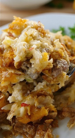 Cheesy Sausage Hash Brown Casserole is a delicious hash brown casserole recipe perfect for Christmas morning. Cheesy Sausage Hash Brown Casserole
