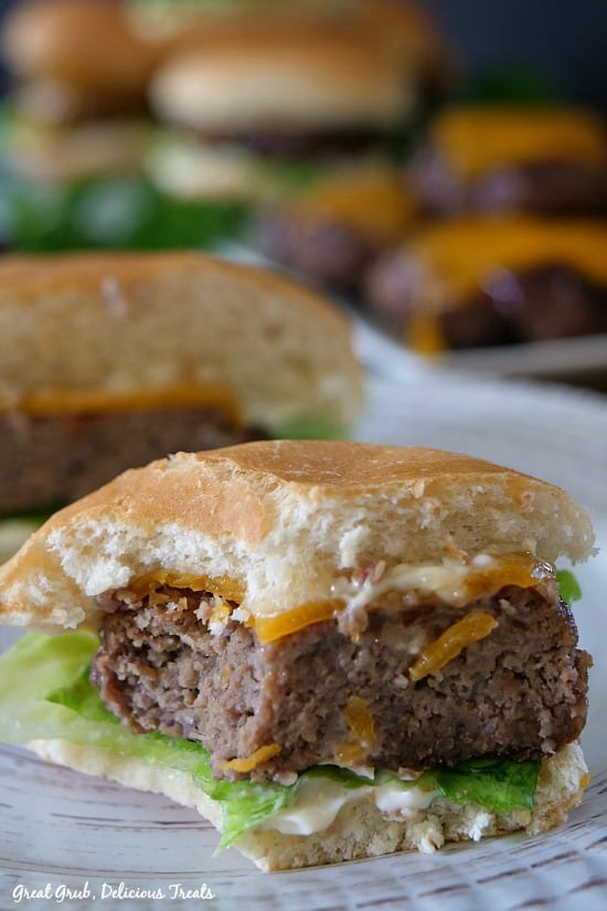 Grilled BBQ Meatloaf Sliders are tasty little meatloaf burgers grilled and finished off with melted cheese. #bbqrecipes #barbecueideas #yummy #appetizers #greatgrubdelicioustreats Grilled BBQ Meatloaf Sliders are tasty little meatloaf burgers grilled and finished off with melted cheese.