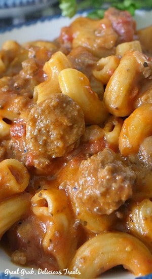 Cheesy Italian Sausage Pasta is a delicious and cheesy Italian pasta recipe loaded with Italian sausage, pasta and mozzarella cheese. #cheesypastarecipe #onepotrecipe #comfortfoods #italiansausagerecipe #greatgrubdelicioustreats