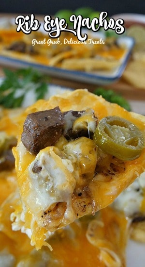 Rib Eye Nachos are an easy and delicious appetizer recipe using leftover rib eye, topped with two types of cheese and jalapenos.
