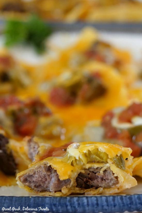 Rib Eye Nachos are a delicious leftover rib eye recipe loaded with cheese, jalapenos and corn tortillas.