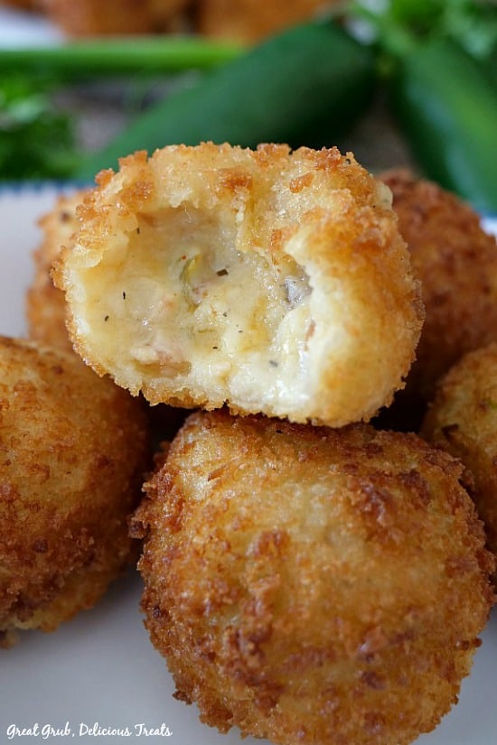 Loaded Mashed Potato Bites are simply scrumptious, loaded with creamy potatoes, crumbled bacon, onions, cheese, sour cream and more, and make a delicious appetizer.