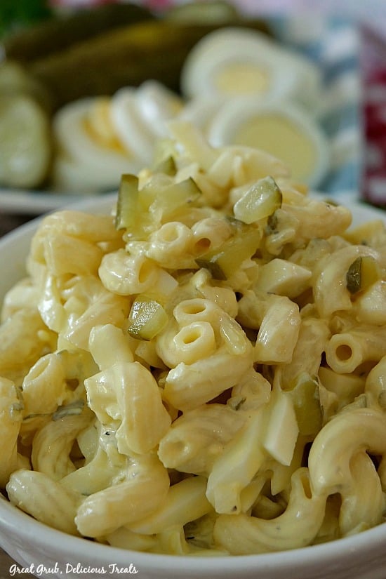 Deviled Egg Macaroni Salad is creamy, flavorful and the perfect side dish recipe. #easyrecipes #yummy #homemade #pastasalad #greatgrubdelicioustreats Deviled Egg Macaroni Salad is creamy, flavorful and the perfect side dish recipe.