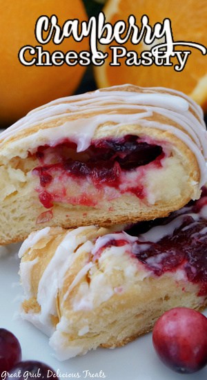 A close up photo of two slices of cranberry pastry ring.