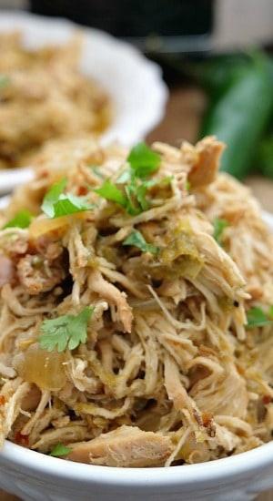 Crock Pot Hatch Salsa Chicken is tender chicken, cooked in a delicious hatch salsa the served with rice and beans or used with tacos, burritos and nachos. Crock Pot Hatch Salsa Chicken