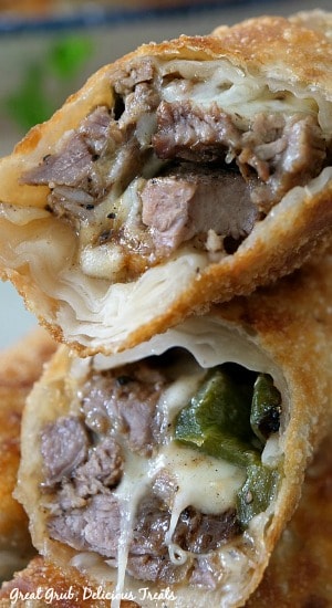 Philly Cheesesteak Egg Rolls are a delicious appetizer recipe, loaded with rib eye steak, bell peppers, onions, and fried to perfection.