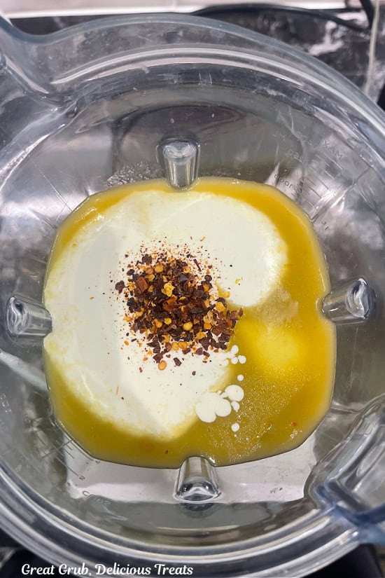 Lots of zesty seasonings are added to the blender.