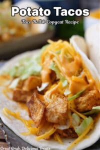 A flour tortilla with seasoned potatoes, cheese, lettuce and chipotle sauce.