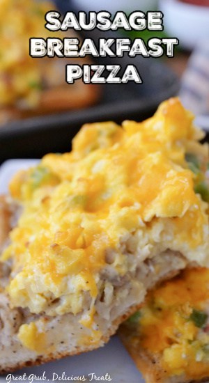 A close up of a slice of breakfast pizza with the title of the recipe at the top.