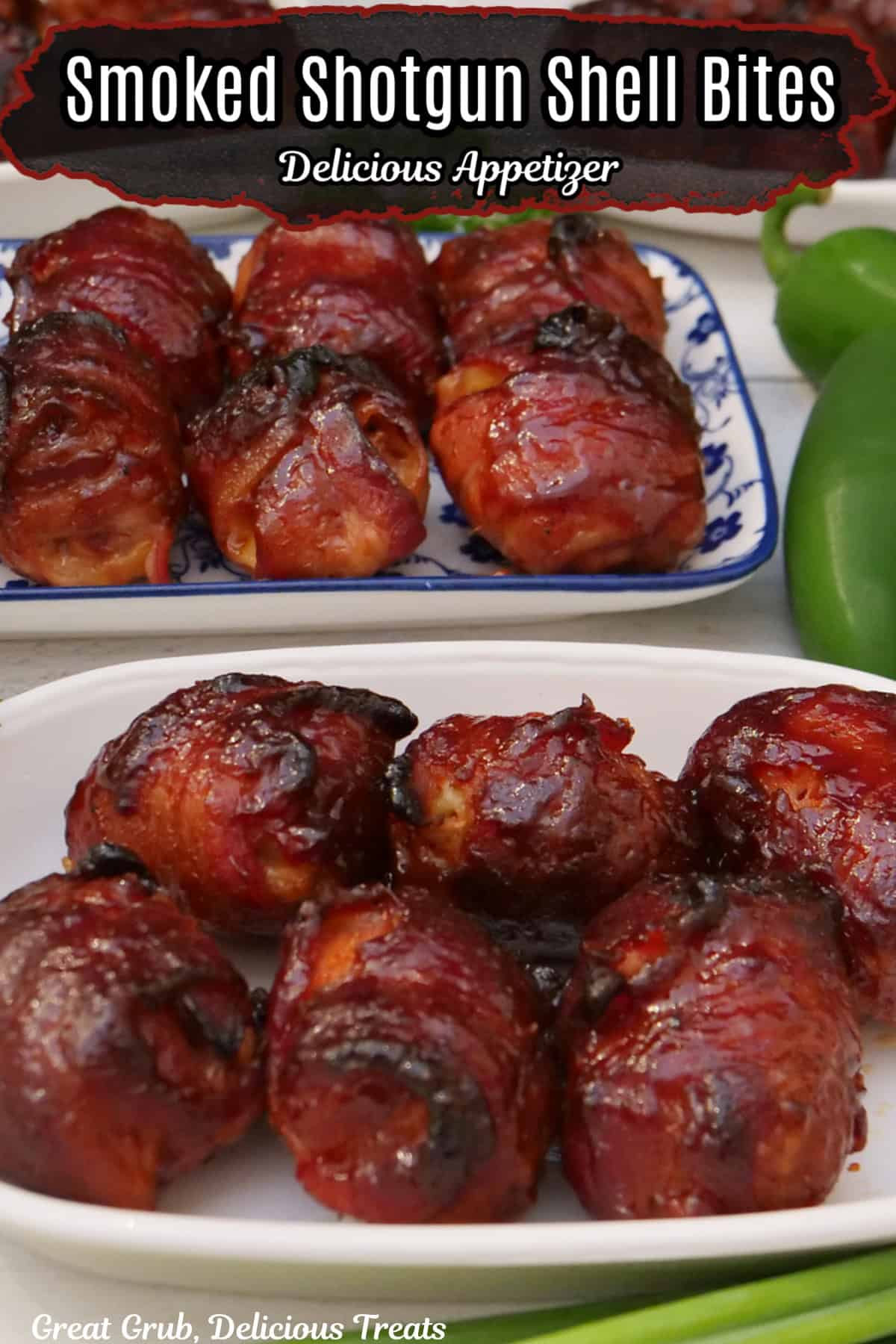Two white plates on a white surface with bite-size, bacon wrapped shotgun shell bites on them.